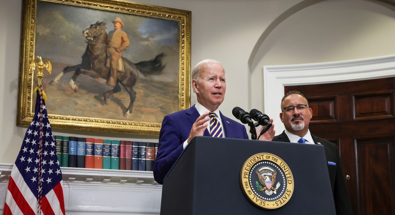 U.S. President Joe Biden, joined by Education Secretary Miguel Cardona, speaks on student loan debt in the Roosevelt Room of the White House August 24, 2022 in Washington, DC.