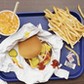 Elevated View of a Tray With Fries, a Hamburger and Lemonade