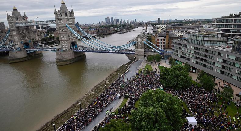 People attend a vigil to remember the victims of the attack on London Bridge and Borough Market, at Potters Field Park, in central London, Britain, June 5, 2017.