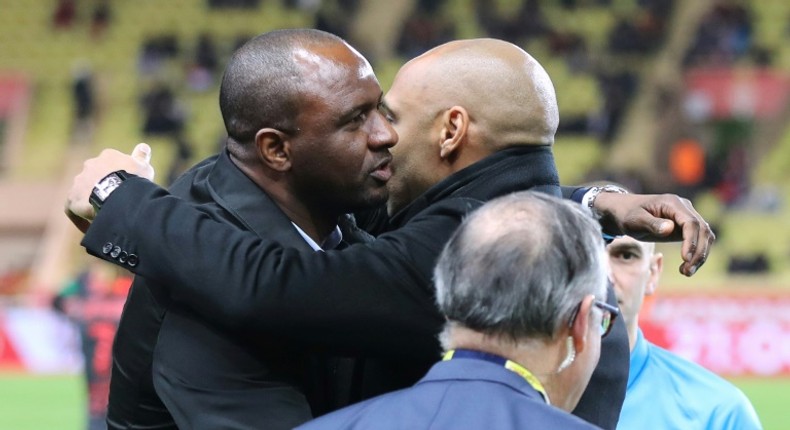 Thierry Henry embraces Patrick Vieira prior to Wednesday's clash between Monaco and Nice