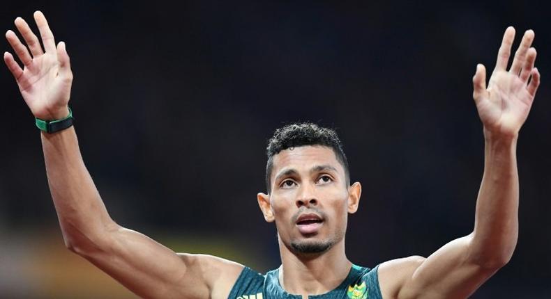 South Africa's Wayde Van Niekerk celebrates after winning the final of the men's 400m at the 2017 IAAF World Championships in London on August 8, 2017