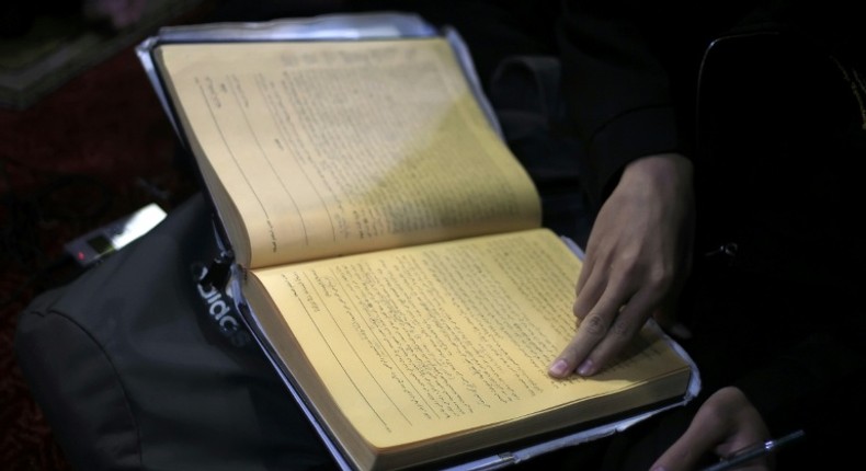 A student reads at Al-Azhar mosque, which developed into a prestigious Islamic university where the female student seen in the viral video studies