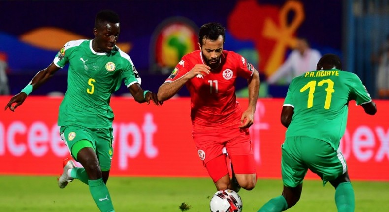 Tunisia star Taha Yassine Khenissi (C) playing against Senegal in a 2019 Africa Cup of Nations semi-final in Egypt