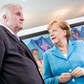 ngela Merkel (Christian Democratic Union - CDU) speaks with interior minister Horst Seehofe