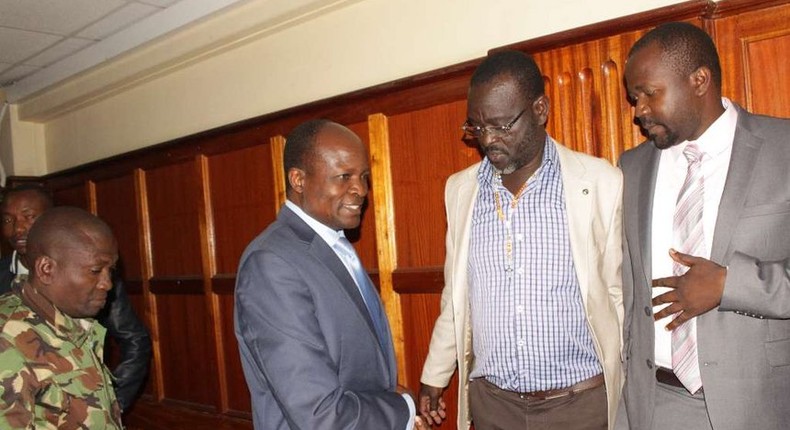 Migori Governor Okoth Obado his co-accused Caspal Obiero and Michael Oyamo