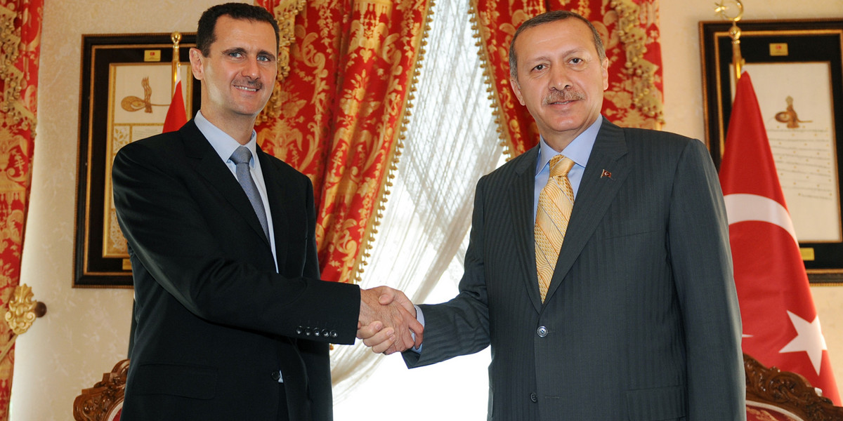 Syrian President Bashar Assad, left, shakes hands with then Turkish Prime Minister Recep Tayyip Erdoğan during a meeting in Istanbul, Turkey, in 2009.