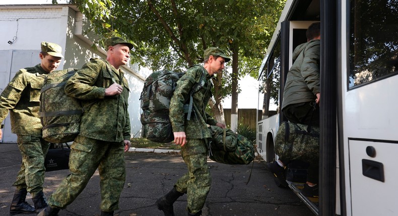 Russian recruits take a bus near a military recruitment center in Krasnodar, Russia, Sunday, Sept. 25, 2022.