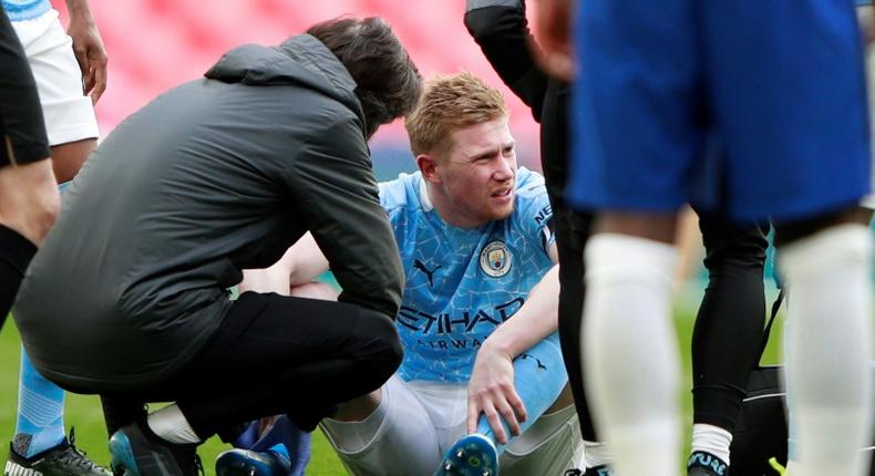 De Bruyne down: Kevin De Bruyne (centre)had to be replaced with an ankle injury during Manchester City's FA Cup semi-final against Chelsea