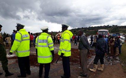 Police officers at an accident scene 