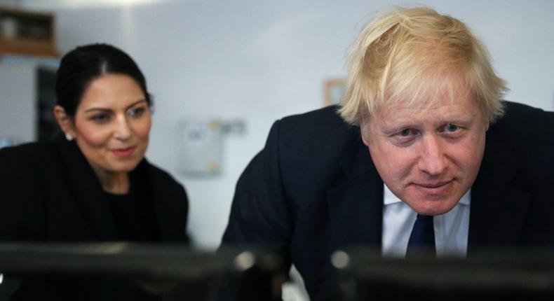 Home Secretary Priti Patel and UK Prime Minister Boris Johnson.
