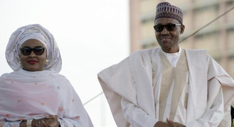 Nigerian President Mohammadu Buhari arrives with his wife Aisha, before taking oath of office in Abuja, on May 29, 2015
