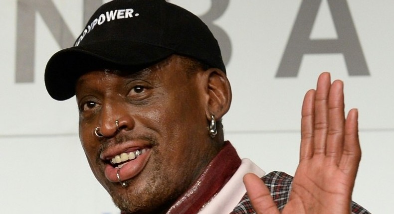 Former NBA star Dennis Rodman, seen in 2013, will be arraigned in January for misdemeanor hit and run charges