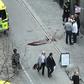 Ambulance in a street near the site were a truck was driving into a crowd in central Stockholm
