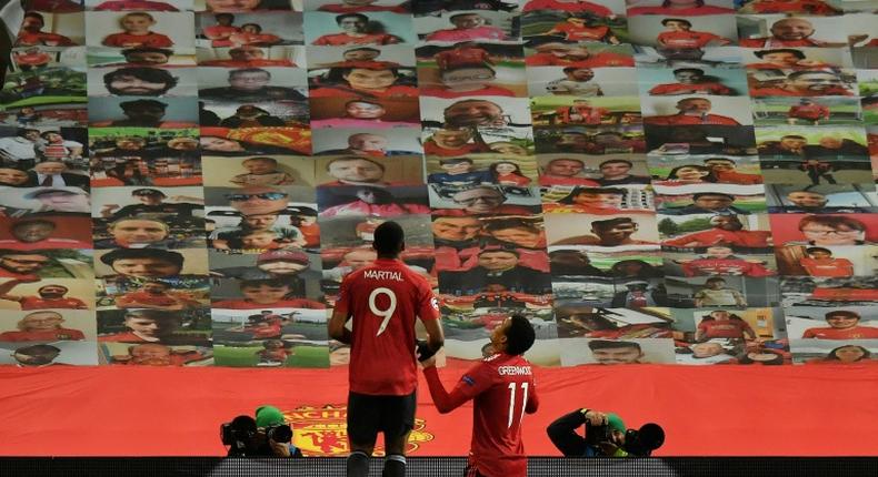 Manchester United's Mason Greenwood (right) celebrates his goal against Leipzig at Old Trafford