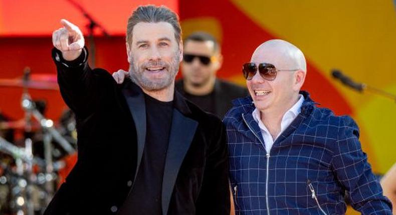 Pitbull Encouraged John Travolta to Go Bald