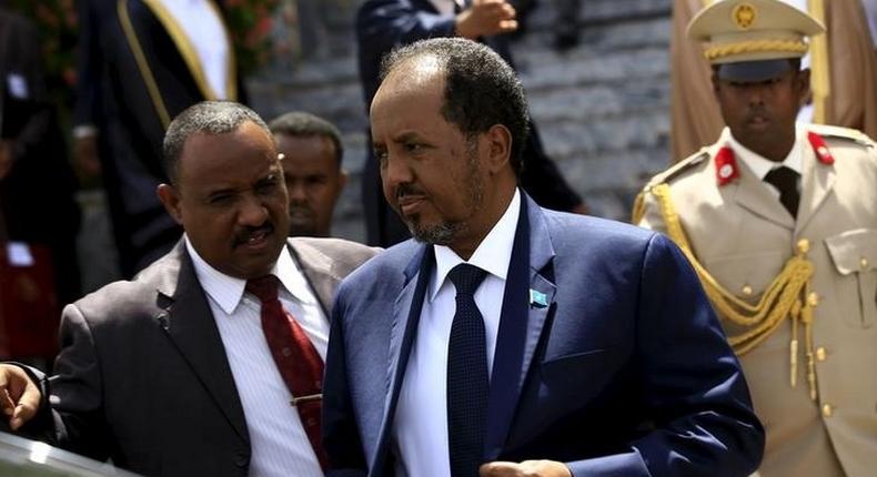 Somalia's President Hassan Sheikh Mohamud (C) walks out after attending Sudan's President Omar Hassan al-Bashir (not pictured) inauguration ceremony at National Assembly in Omdurman, June 2, 2015. REUTERS/Mohamed Nureldin Abdallah