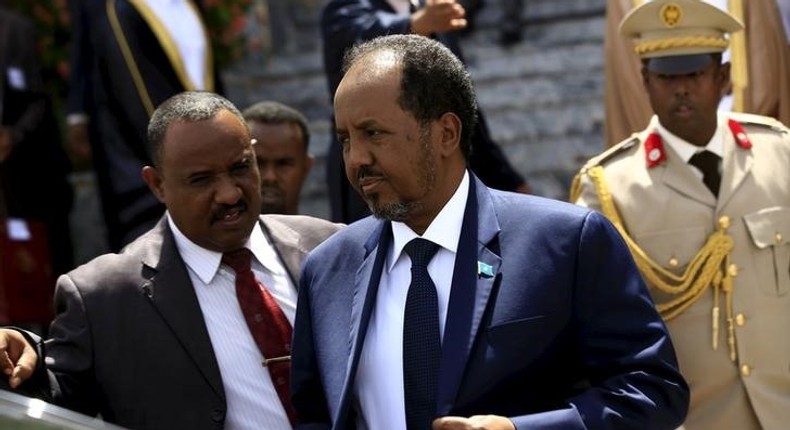 Somalia's President Hassan Sheikh Mohamud (C) walks out after attending Sudan's President Omar Hassan al-Bashir (not pictured) inauguration ceremony at National Assembly in Omdurman, June 2, 2015. REUTERS/Mohamed Nureldin Abdallah