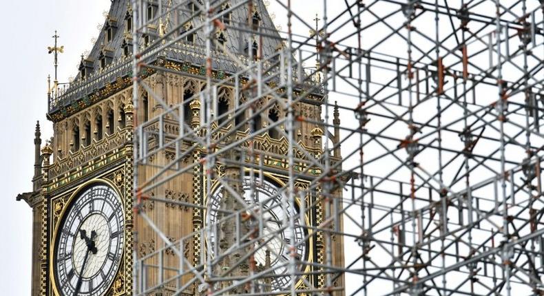 London's Elizabeth Tower looms over the Houses of Parliament and is one of Britain's most popular tourist attractions