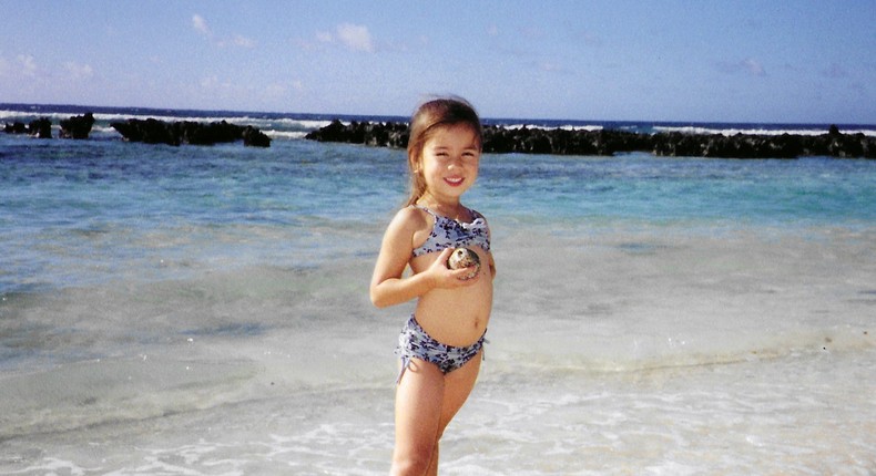 That's the author posing with a shell on one of Guam's pristine beaches in 2001. Hardly any Americans visit Guam, and I think they're missing out.Joey Hadden/Business Insider