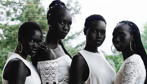 The South Sudanese, particularly the Dinka and Nuer ethnic groups, are known for their exceptionally deep, dark complexions