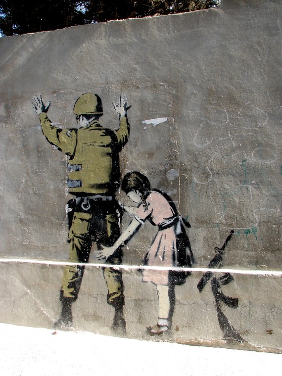 Banksy, graffiti w Betlejem, fot. welshkaren/flickr