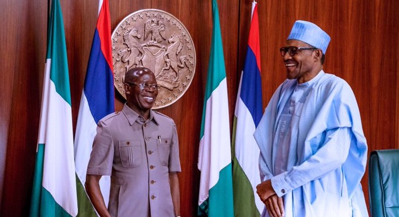 President Buhari is congratulated by APC Chairman Adams Oshiomhole after the FEC meeting of September 11, 2019  (Tolu Ogunlesi) 