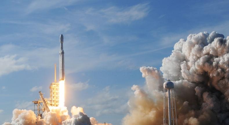 The SpaceX Falcon Heavy launches from Pad 39A at the Kennedy Space Center in Florida, on February 6, 2018, on its demonstration mission. - (Photo by JIM WATSON/AFP via Getty Images)