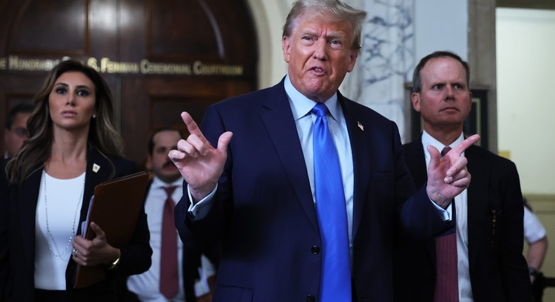 Former U.S. President Donald Trump speaks to the media after exiting the courtroom for a lunch recess during the first day of his civil fraud trial at New York State Supreme Court.Michael M. Santiago/Getty Images