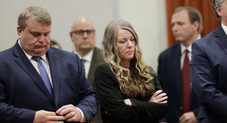 Lori Vallow, the woman accused of murdering her children, stands as the verdict is read in the caseKyle Green/Associated Press