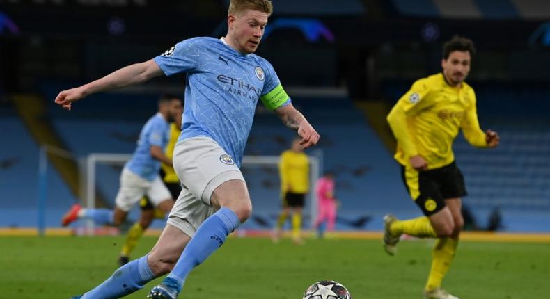 Leading from the front: Manchester City captain Kevin De Bruyne (left)scored the opening goal against Borussia Dortmund