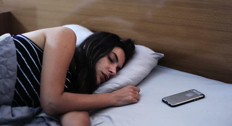 Here are 3 undeniable reasons to not sleep with your phone in bed [Credit: Shutterstock]