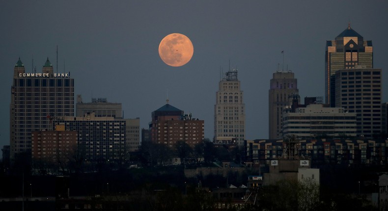 A supermoon rises behind a downtown office building in Kansas City, Missouri, in 2020.Charlie Riedel/AP