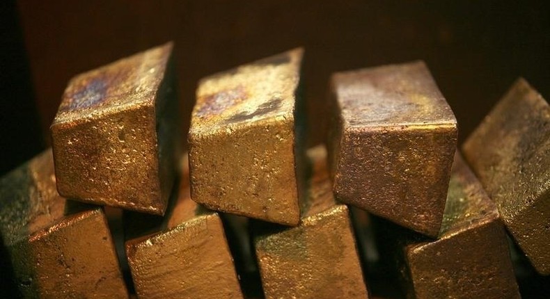 Gold bars are displayed at South Africa's Rand Refinery in Germiston May 30, 2006. 