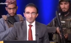 Uzbrojeni talibowie stali za plecami prezentera w afgańskiej telewizji
