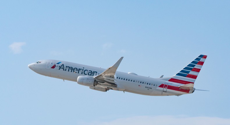 Shares of American Airlines closed down more than 13% Wednesday after it slashed revenue and margin guidance for the second quarter. AaronP/Bauer-Griffin/GC Images