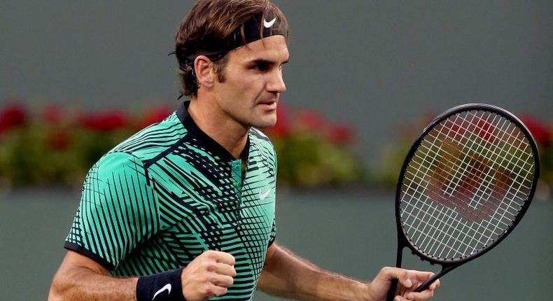 Roger Federer of Switzerland celebrates match point against Steve Johnson of the US during their BNP Paribas Open third round match, at the Indian Wells Tennis Garden in California, on March 14, 2017