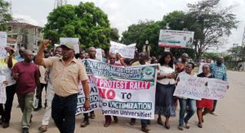 Members of the Academic Staff Union of Universities (ASUU), Federal University of Technology Owerri (FUTO) chapter in a protest march, in Owerri, on Thursday.