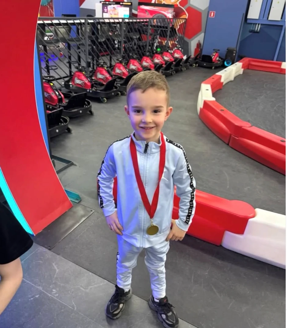 Željko sa medaljom oko vrata