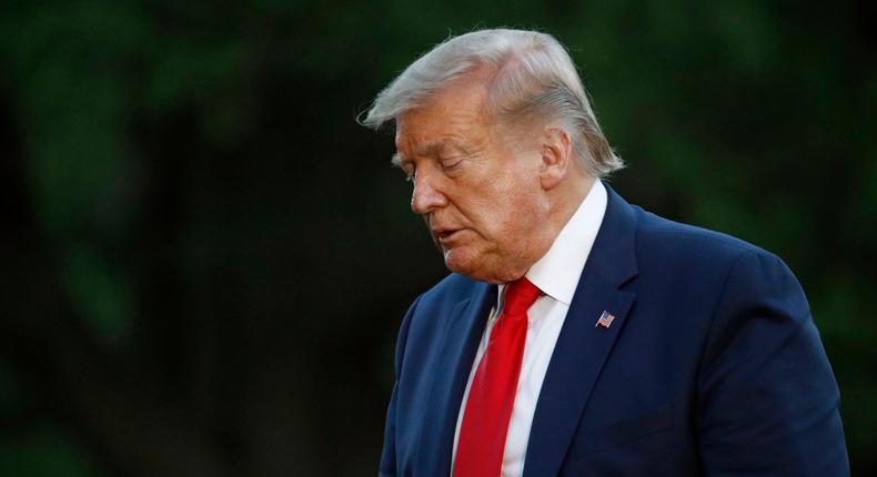 President Donald Trump walks across the South Lawn of the White House in Washington, Saturday, May 30, 2020, after stepping off Marine One as he returns from Kennedy Space Center for the SpaceX Falcon 9 launch. (AP Photo/Patrick Semansky)