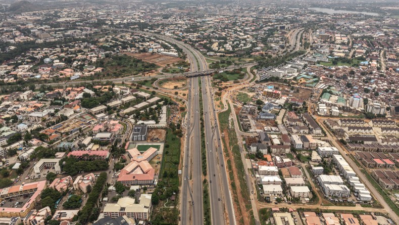 This aerial view shows Abuja, on May 20, 2025. [Photo by OLYMPIA DE MAISMONT/AFP via Getty Images]