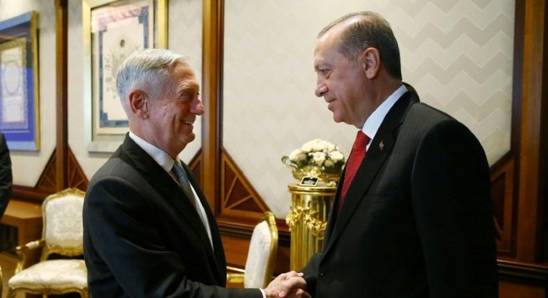 Turkish President Recep Tayyip Erdogan (R) greets US Defense Secretary James Mattis, in Ankara for talks focussed on US arming of a Syrian Kurdish militia, which Turkey views as a terror group. Picture by Turkish Presidential press service.