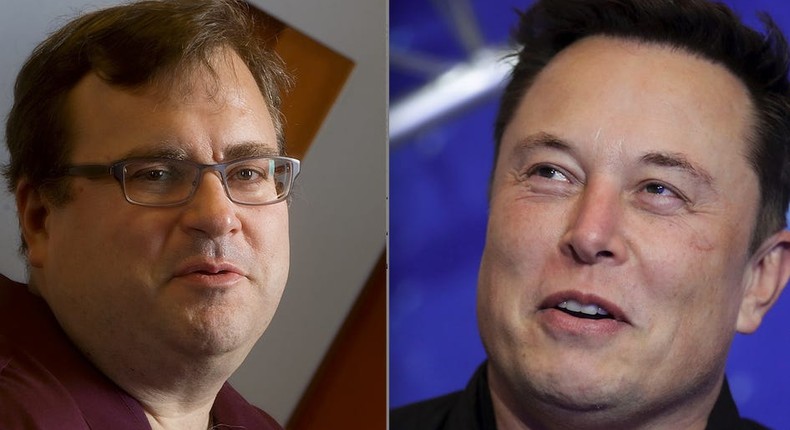 Reid Hoffman sits in the lobby of LinkedIn's Mountain View, Calif., headquarters on Tuesday, May 7, 2013. Elon Musk arrives on the red carpet for the Axel Springer media award in Berlin on Dec. 1, 2020.