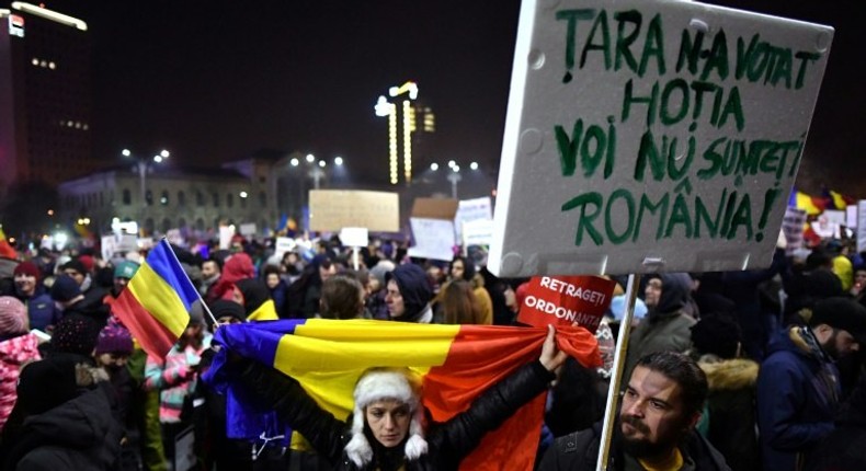 Demonstrators protest in front of the government headquarters in Bucharest, on February 3, 2017