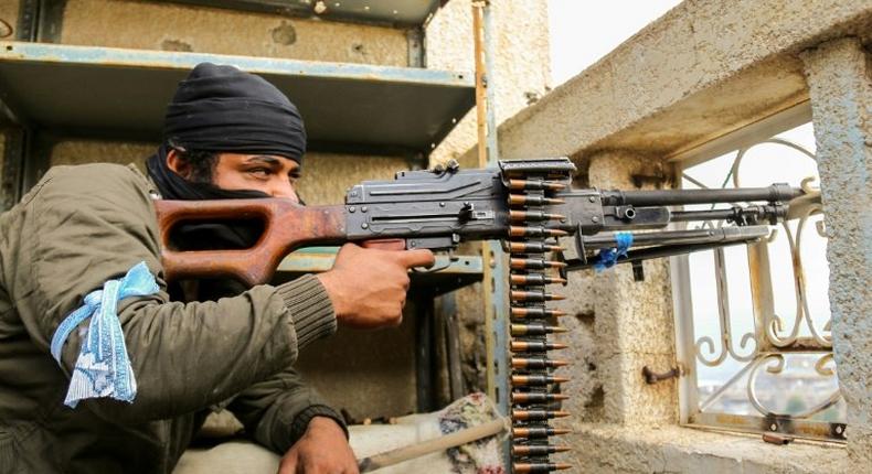 Tribesman from the Popular Resistance Committees, supporting forces loyal to Yemen's Saudi-backed President Abedrabbo Mansour Hadi, in the city of Taez