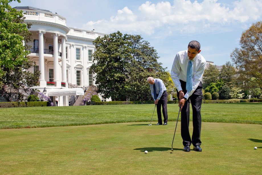 Obama and Biden practice their putting on the White House putting green April 24, 2009.