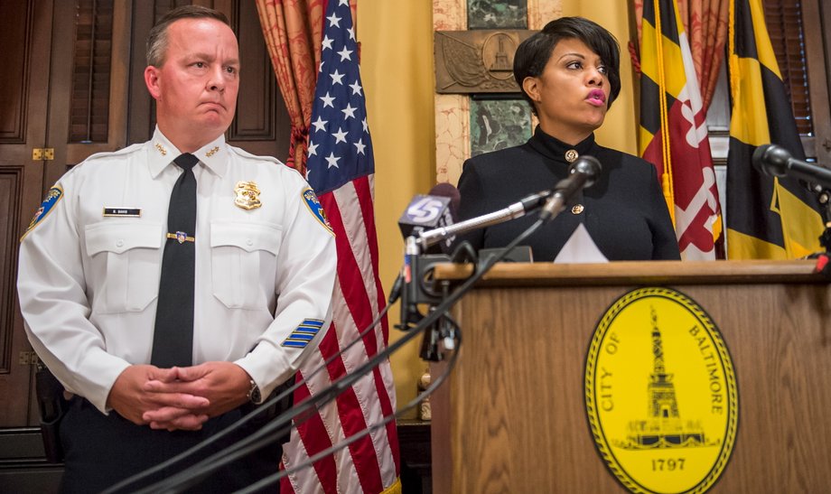 Baltimore Mayor Stephanie Rawlings-Blake speaks next to Interim Police Commissioner Kevin Davis during a news conference in Baltimore, Maryland, July 8, 2015.