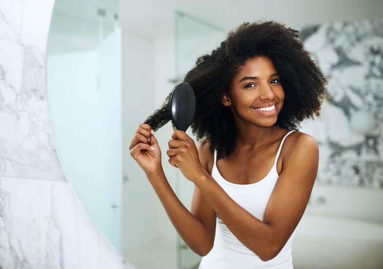 Brushing hair(The Independent) 