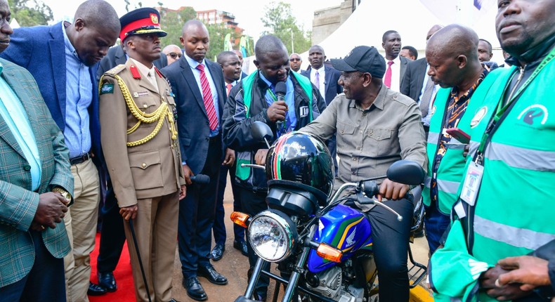 President William Ruto interacting with entrepreneurs during the launch of Hustler Fund in Nairobi on Wednesday, November 30, 2022