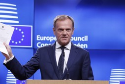 European Council President Donald Tusk holds a news conference after receiving British Prime Ministe