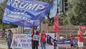 Supporters of Donald Trump demonstrate at the entrance of the Ronald Reagan Presidential Library prior to the second 2024 Republican presidential primary debate in Simi Valley, Calif., on Sept. 27, 2023.